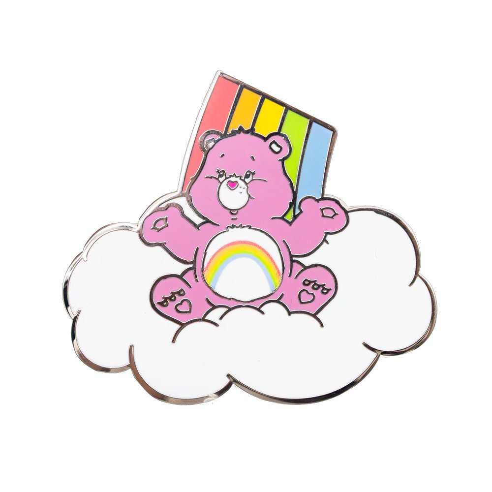 An officially licensed collection of six connecting Care Bears enamel pins forming a colorful rainbow bridge, featuring a Grumpy Bear pin with hanging raindrop charms