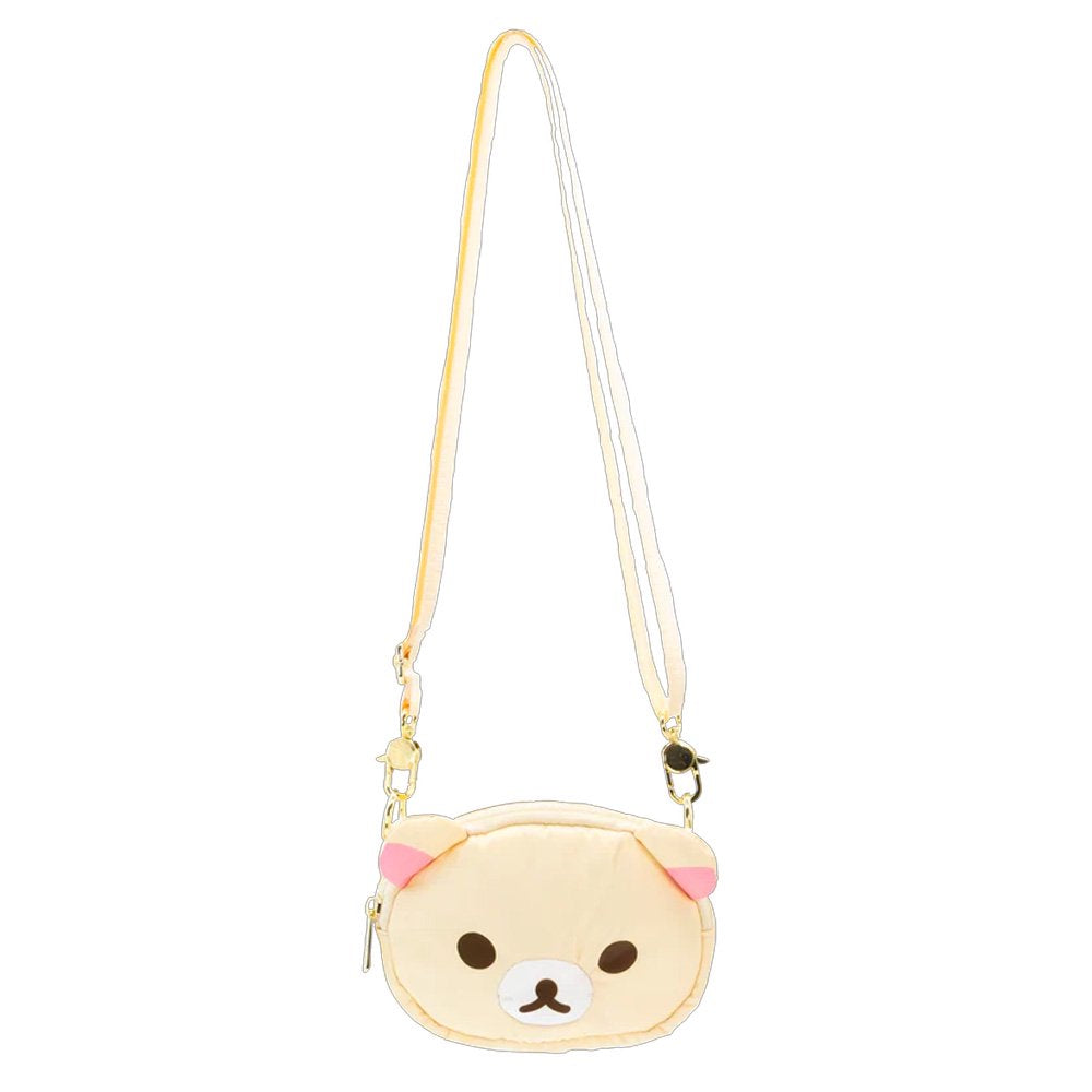 An officially licensed Korilakkuma puffy crossbody bag in an ivory color, shaped like the character's head with round ears. The bag includes a detachable ivory shoulder strap with gold-tone hardware.