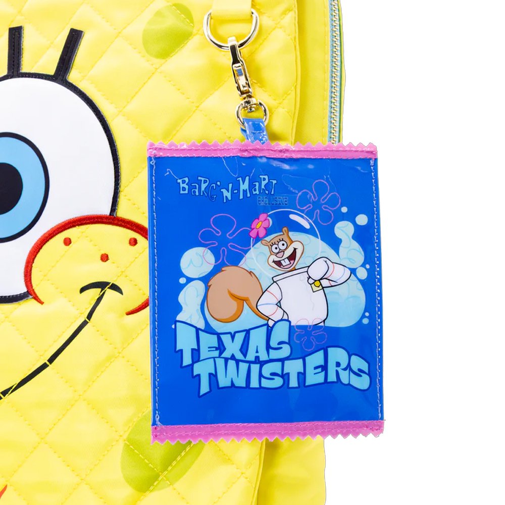An officially licensed collection of six SpongeBob SquarePants mystery snack-themed coin bag charms, such as Sea Cents Crunch and Snail-Po, arranged around a yellow vending machine-style package