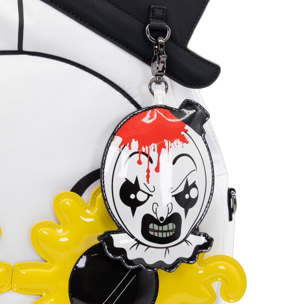 Six collectible Terrifier 2 mystery blind box bag charms showing various versions of Art the Clown and the Little Pale Girl
