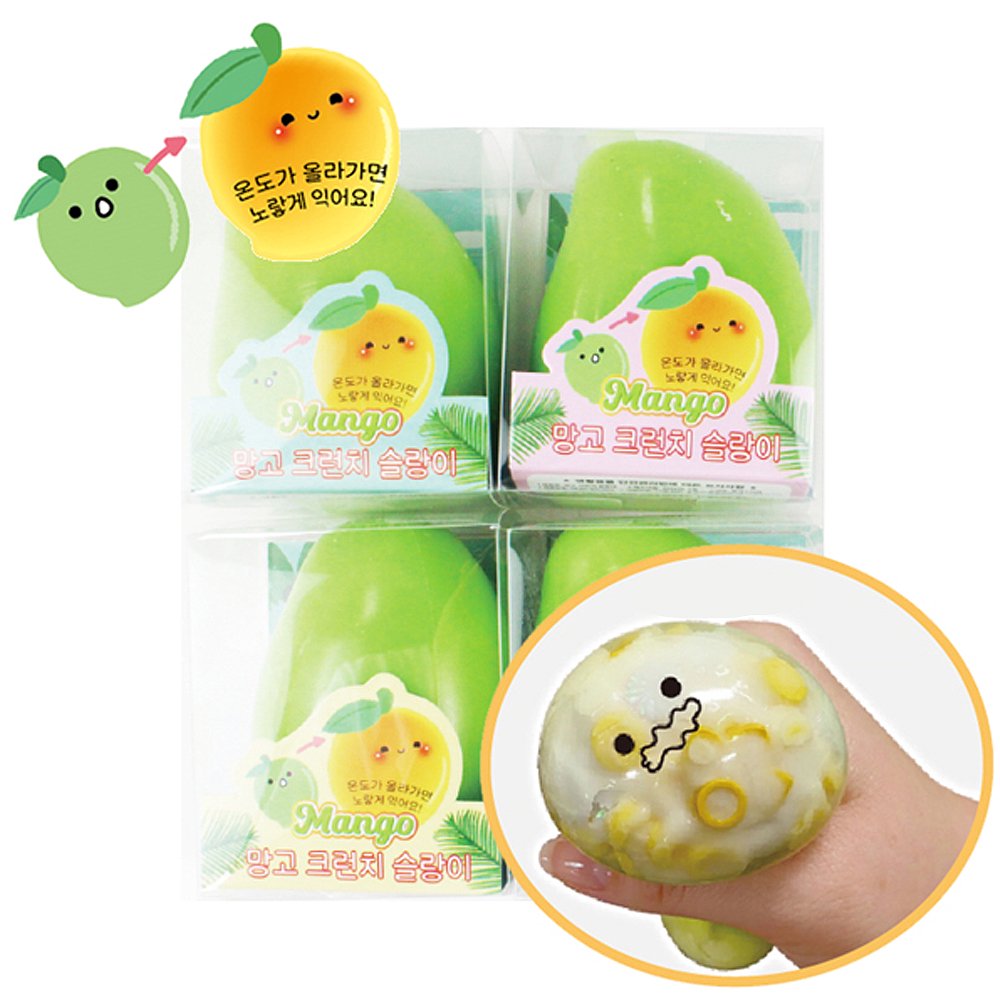 Four individual clear boxes of green-to-yellow color-changing Crunchy Mango Squishy Toys with Korean text, alongside a close-up inset of a hand squeezing the soft squishy showing internal yellow ASMR crunch beads, perfect for stress relief, anxiety relief, party favor goodie bag fillers, Christmas stocking stuffers, and holiday gift sets