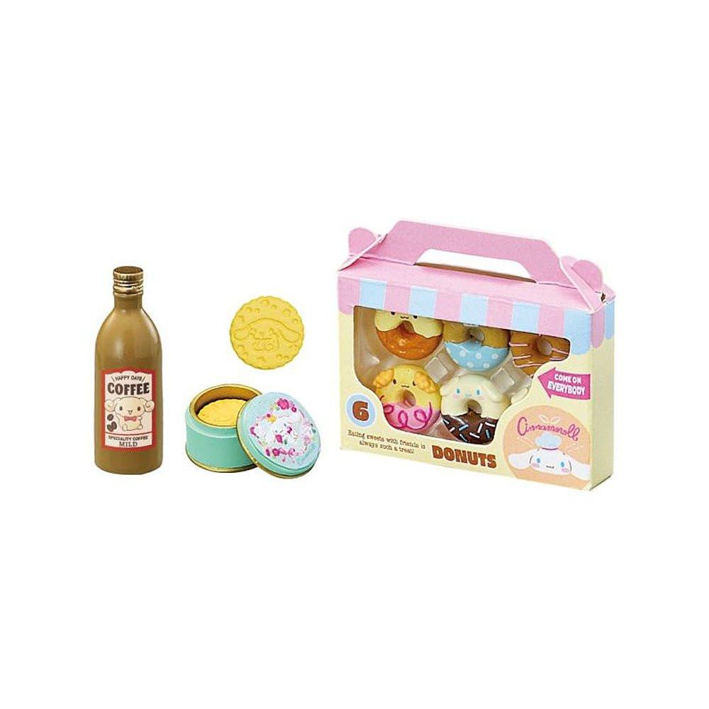Set of Cinnamoroll toy donuts with a coffee bottle and cookies on a white background