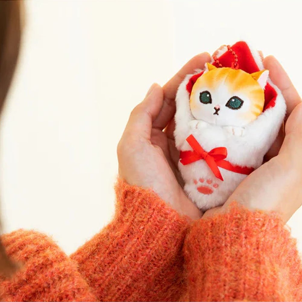 holding kawaii Mofusand cat plush in swaddle key ring keychain stuffed animal