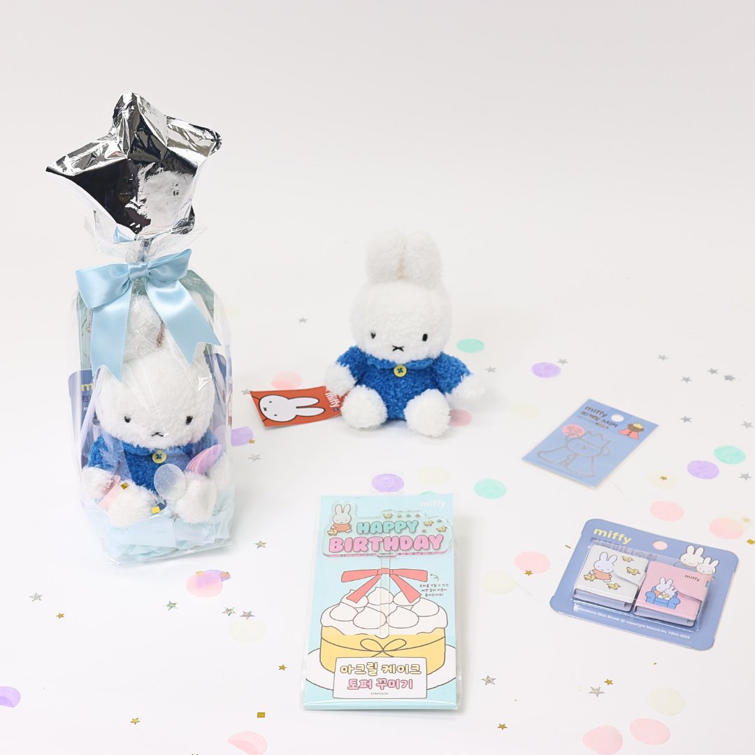 A collection of Miffy-themed birthday gifts including plush keychains, mini notebooks, metal deco stickers, a cake topper, and a letter set, all packaged with a 'Happy Birthday' theme.