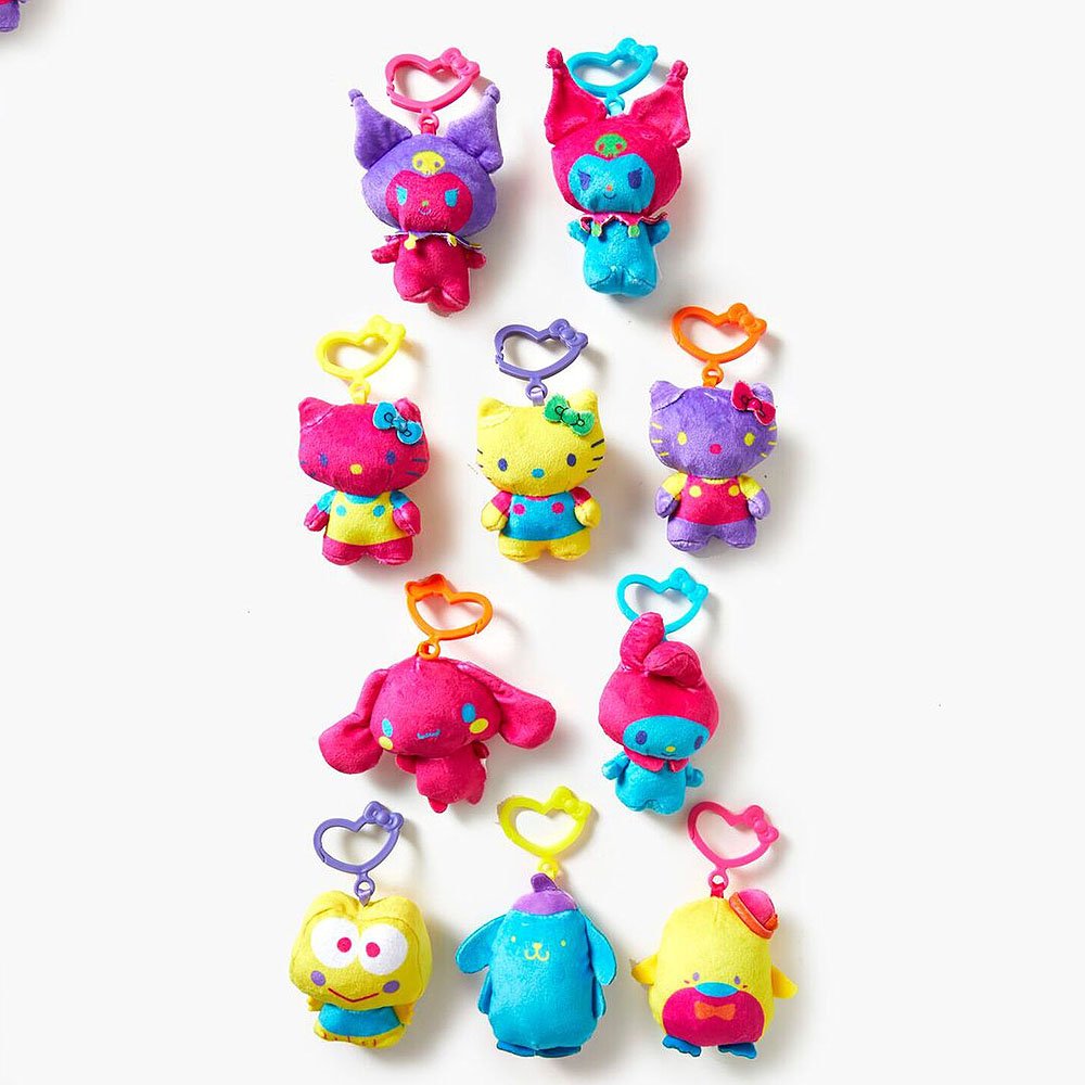 A collection of colorful Sanrio character plushies with clip-On attachments, including Hello Kitty, My Melody, and others.
