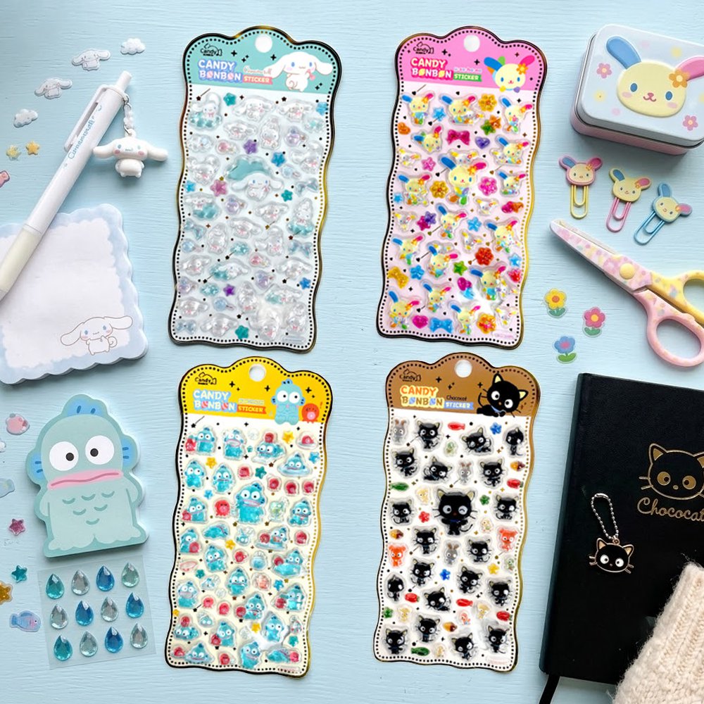 Four colorful sheets of officially licensed Sanrio Candy Bonbon sticker packs, featuring raised, 3D epoxy stickers of Cinnamoroll, Hangyodon, Chococat, and Usahana
