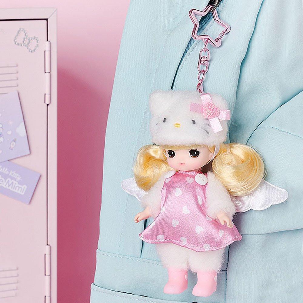 Little mimi Hello Kitty Plush keychain of a character with blonde hair and a pink dress attached to a blue bag.