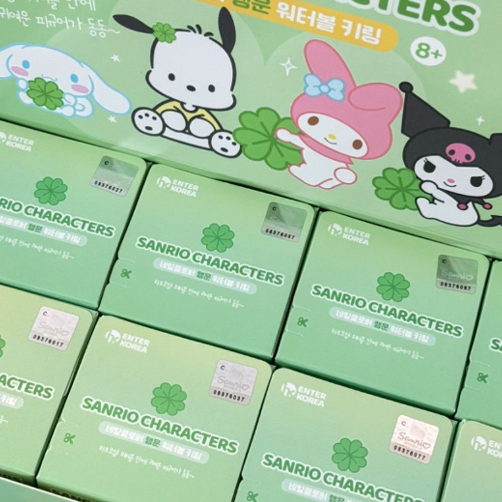 Stack of green boxes featuring Sanrio character illustrations on a white background