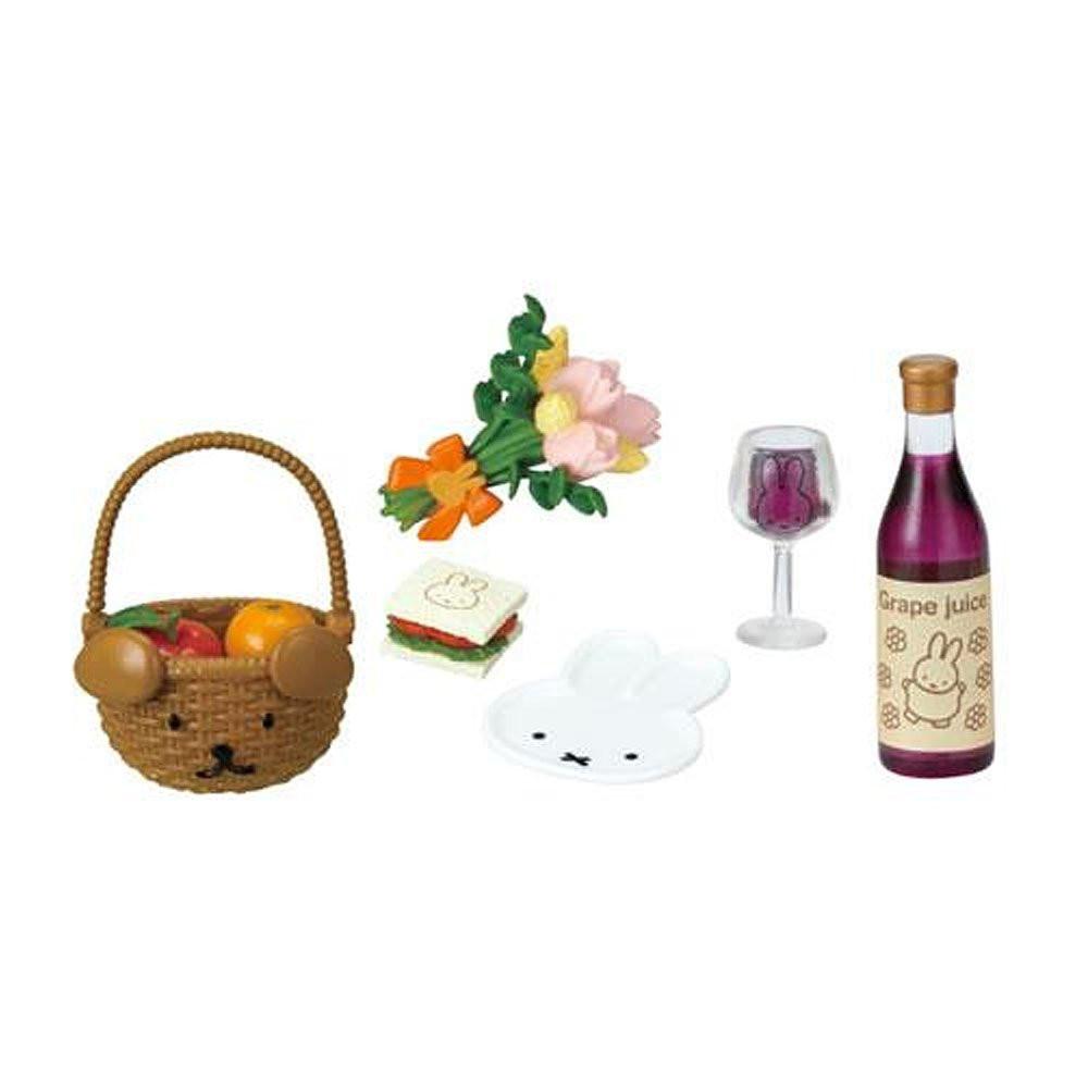 Set of miniature Miffy items including a basket, flowers, a bottle, and a glass on a white background