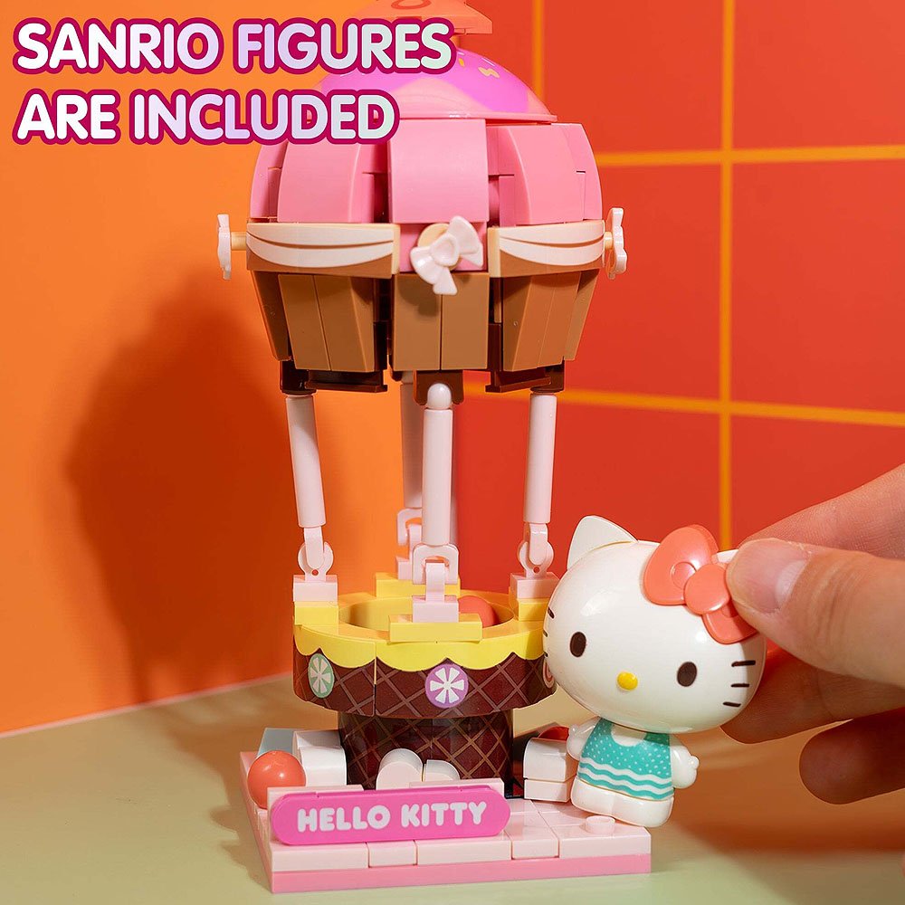 Hello Kitty figure with a pink umbrella on an orange and red checkered background