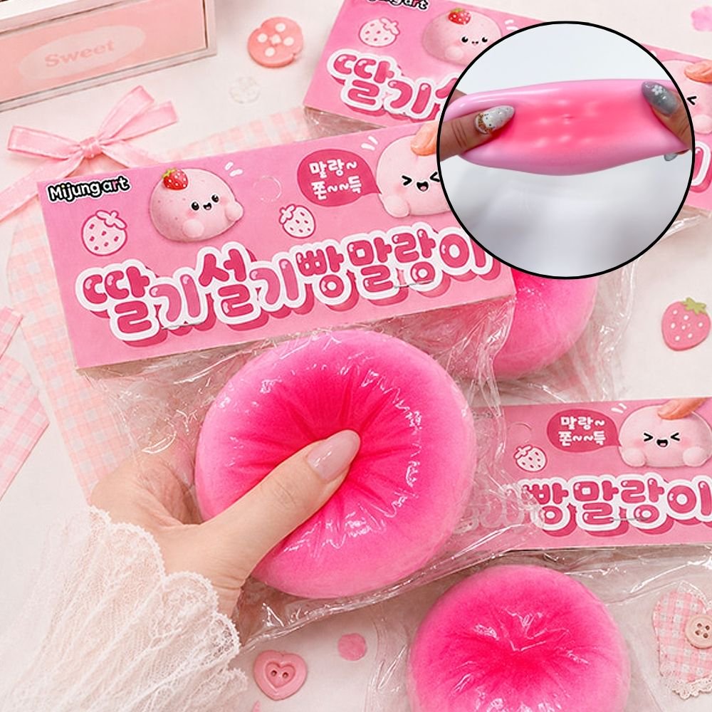 Hand pressing a soft pink Strawberry Rice Cake Bread Squishy Toy with an inset close-up showing ultra-stretchy mochi dough texture, perfect non-edible sensory fidget toy for stress relief and white elephant gifts