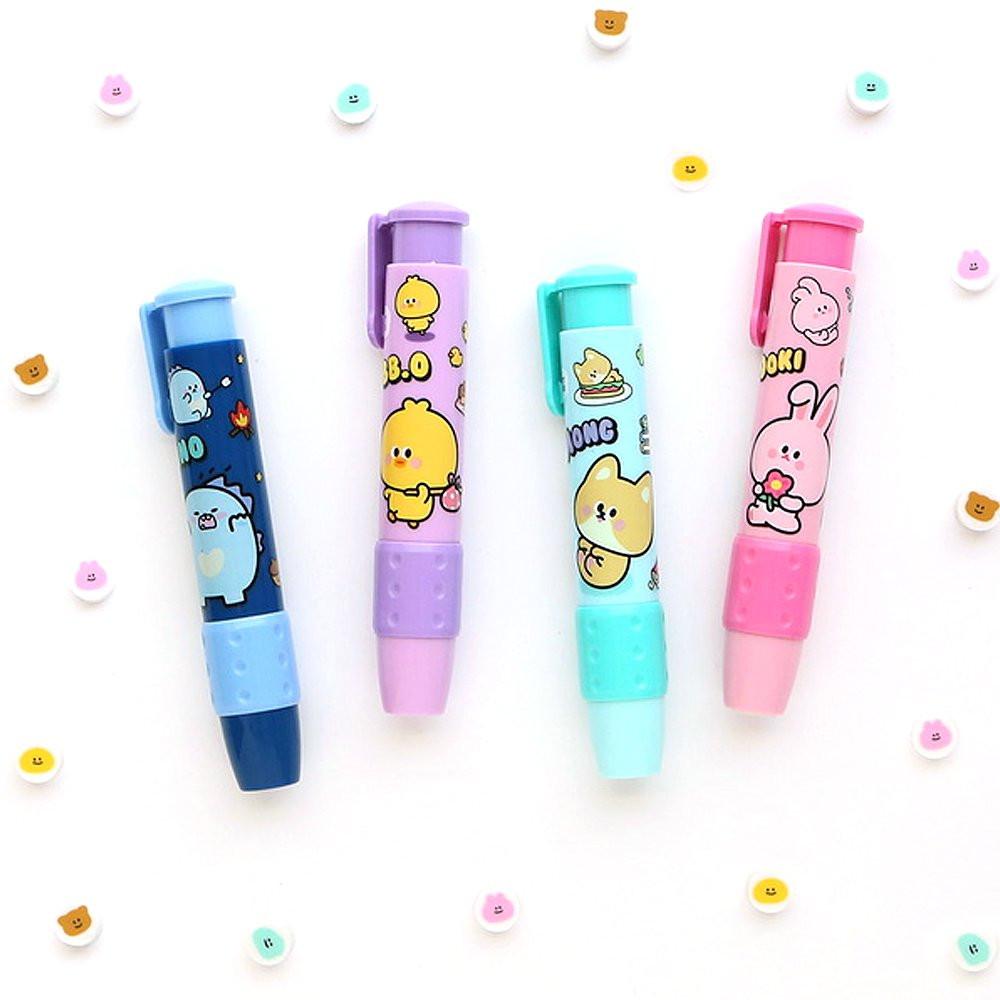 A collection of colorful mechanical erasers with cartoon character designs on them, displayed on a white background with scattered confetti.