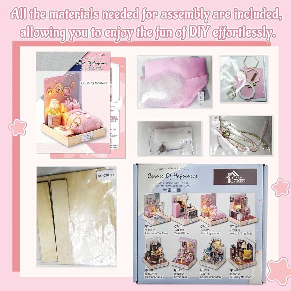 A whimsical DIY miniature bedroom featuring a plush pink bed with bunny pillows, a glowing bedside lamp, and starry wall decor