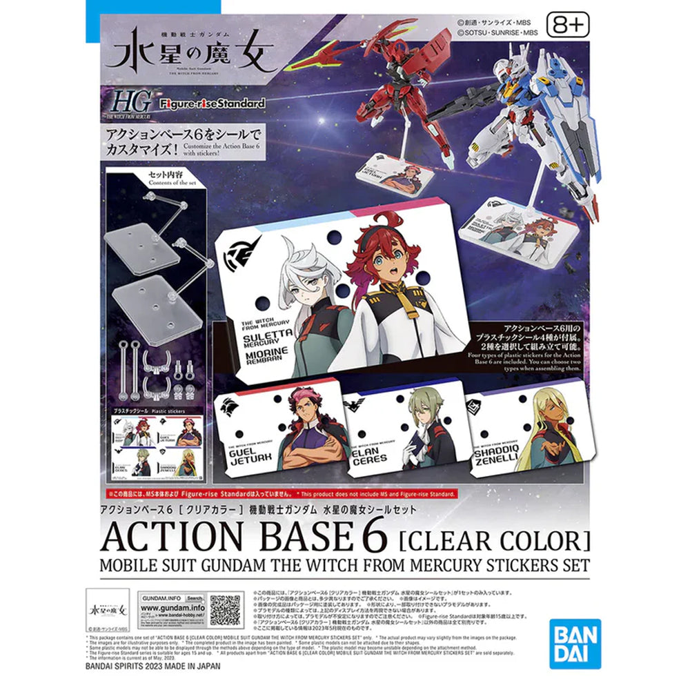 Two officially licensed Bandai Action Base 6 stands in clear plastic. Each features a rectangular base and an articulated support arm, customized with different plastic stickers showing portraits of characters like Suletta, Miorine, Guel, Shaddiq, and Elan.