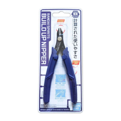 The Bandai Spirits Build Up Nipper for plastic model kits features sharp black metal blades and thick, ergonomic navy blue handles designed for precision cutting.
