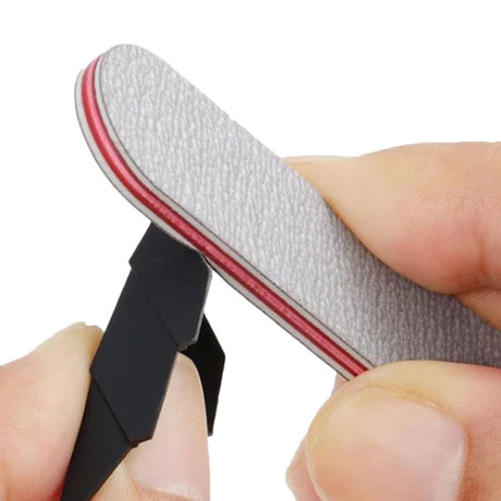 A set of three Bandai Spirits model sanding sticks in their retail packaging, featuring red, blue, and white color-coded edges. Each gray abrasive stick is displayed next to the package to show the different grit levels for plastic model finishing.
