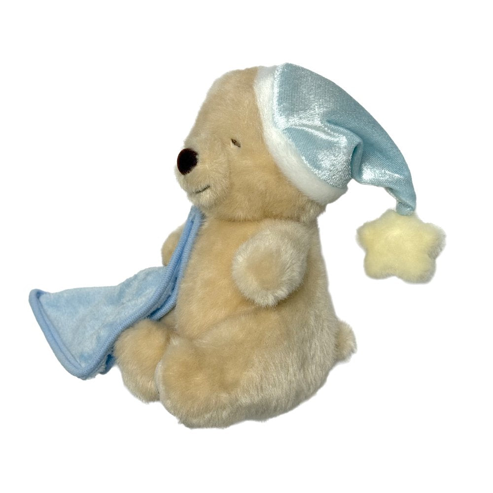 Bella Sweet Dream teddy bear plush toy wearing a blue nightcap with a star and holding a blue blankie with "Bella" embroidered on its foot