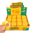 Cheese Squishy Toy retail display box filled with individually wrapped orange yellow cheese blocks