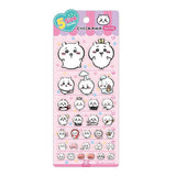 A close-up photograph of a pastel pink, decorative sticker sheet featuring multiple illustrations of the character Chiikawa in five different sizes. A hand with a knuckle ring is shown peeling a large sticker of Chiikawa from the sheet, which contains various designs of Chiikawa in multiple poses and expressions. The background is a soft blue, creating a gentle contrast. The packaging header reads '5 Size Sticker' and 'CHIIKAWA'.