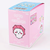 Pink and blue box with cartoon character on a white background