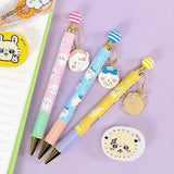 An official licensed collection of Chiikawa mechanical pencils in pink, blue, and yellow. Each pencil features a matching striped ball topper and a dangling enamel character charm of Chiikawa, Hachiware, or Usagi.
