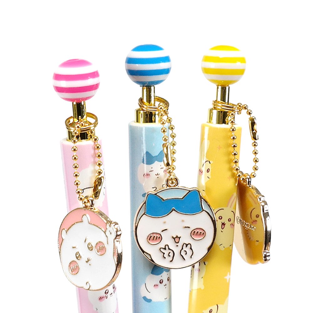 An official licensed collection of Chiikawa mechanical pencils in pink, blue, and yellow. Each pencil features a matching striped ball topper and a dangling enamel character charm of Chiikawa, Hachiware, or Usagi.