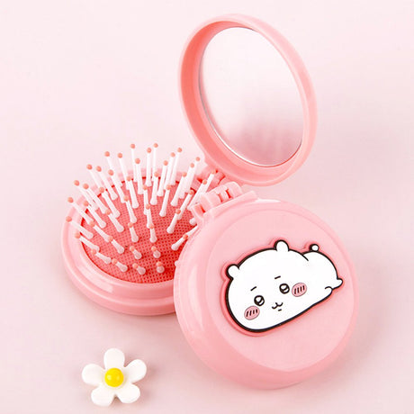 An officially licensed collection of colorful Chiikawa 2-in-1 character mirror & hair brush set in pink