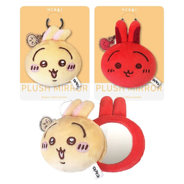 The officially licensed Usagi plush mirror keychains featuring two circular plush heads, one yellow and one red, show Usagi's embroidered face and long ears. The reverse side of the plush, revealing a built-in circular vanity mirror with a metal ring and a small character-themed acrylic charm.