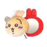 The officially licensed Usagi plush mirror keychains featuring two circular plush heads, one yellow and one red, show Usagi's embroidered face and long ears. The reverse side of the plush, revealing a built-in circular vanity mirror with a metal ring and a small character-themed acrylic charm.