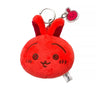 The officially licensed Usagi plush mirror keychains featuring two circular plush heads, one yellow and one red, show Usagi's embroidered face and long ears. The reverse side of the plush, revealing a built-in circular vanity mirror with a metal ring and a small character-themed acrylic charm.