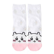 Featuring the pairs of officially licensed Chiikawa white crew-length socks, pink one surrounded by small pink-and-white flowers and blue one surrounded by blue-and-yellow flowers.