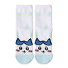 Featuring the pairs of officially licensed Chiikawa white crew-length socks, pink one surrounded by small pink-and-white flowers and blue one surrounded by blue-and-yellow flowers.