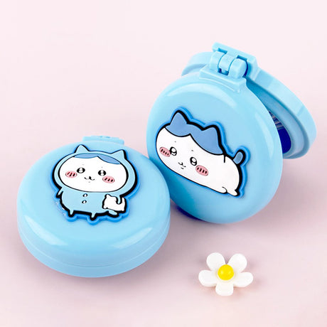 An officially licensed collection of colorful Hachiware 2-in-1 character mirror & hair brush set in blue