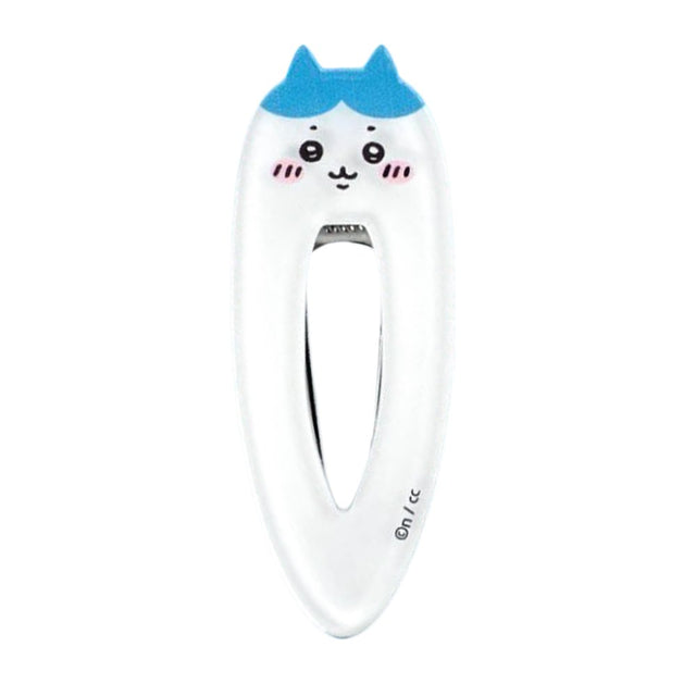 White teardrop-shaped Hachiware character hair clip featuring a minimalist blushing face with blue ears and a sturdy metal spring-loaded mechanism