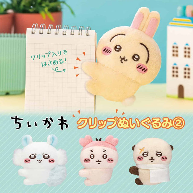 Officially licensed Chiikawa plush clip character assortment featuring Usagi clipped onto a spiral notebook cover alongside mini plush clips of Momonga, Kani, and Rakko
