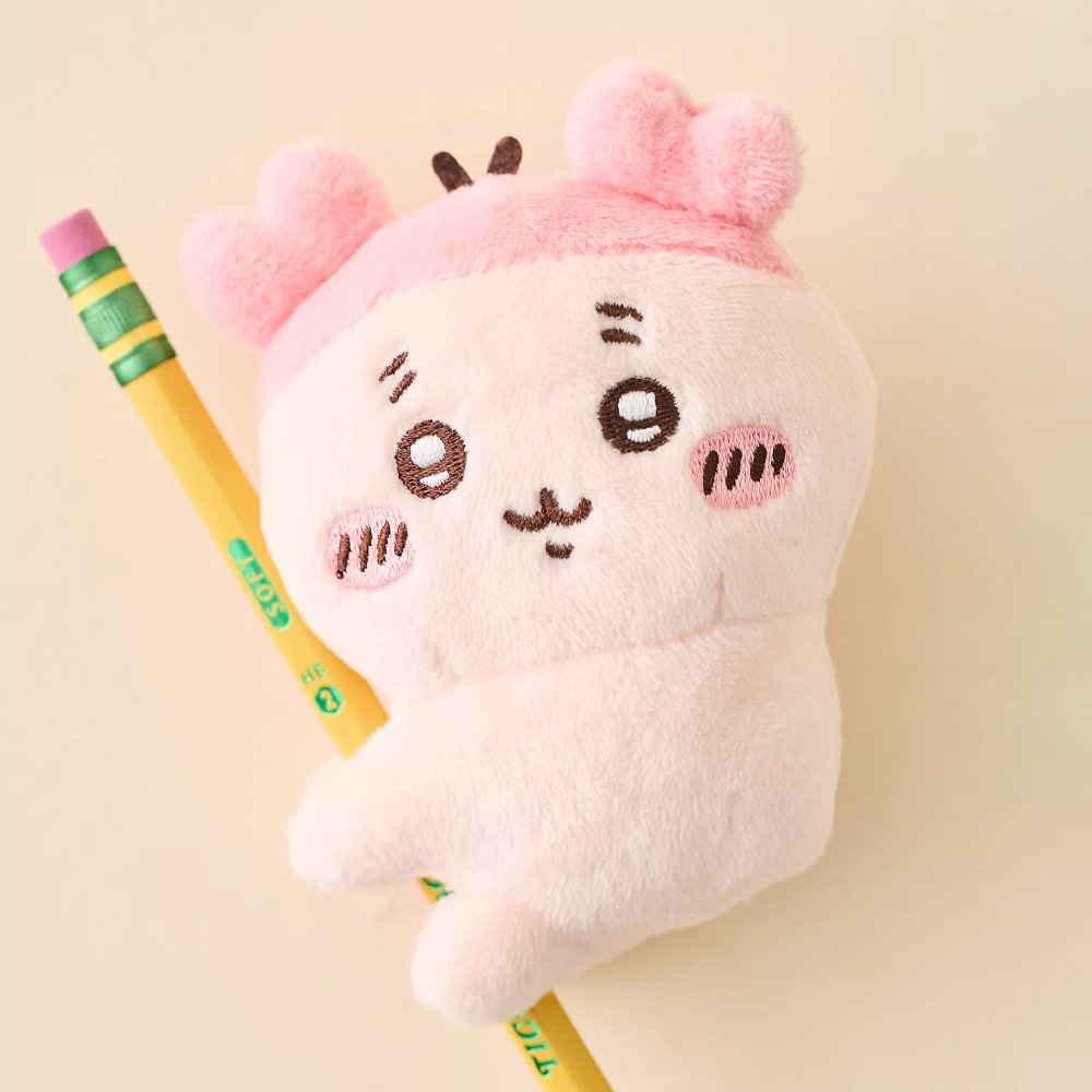 Officially licensed Chiikawa plush clip character assortment featuring Kani clipped onto a pencil