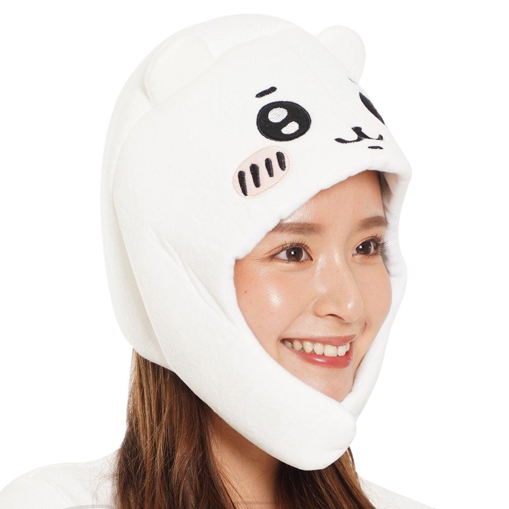 An officially licensed white Chiikawa plush character hat with embroidered eyes, blushing cheeks, and long ear flaps.