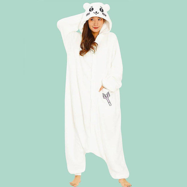 Officially licensed by Chiikawa Kigurumi Onesie Costume, inspired by the adorable characters Chiikawa! Made from high-quality, ultra-soft fleece, this cozy, comfort and cuteness onesie is perfect for lounging at home, conventions, or as a standout costume for any event. With its oversized fit, easy button-up design, and detailed character hood, you’ll feel like you’ve stepped straight into the Chiikawa world!