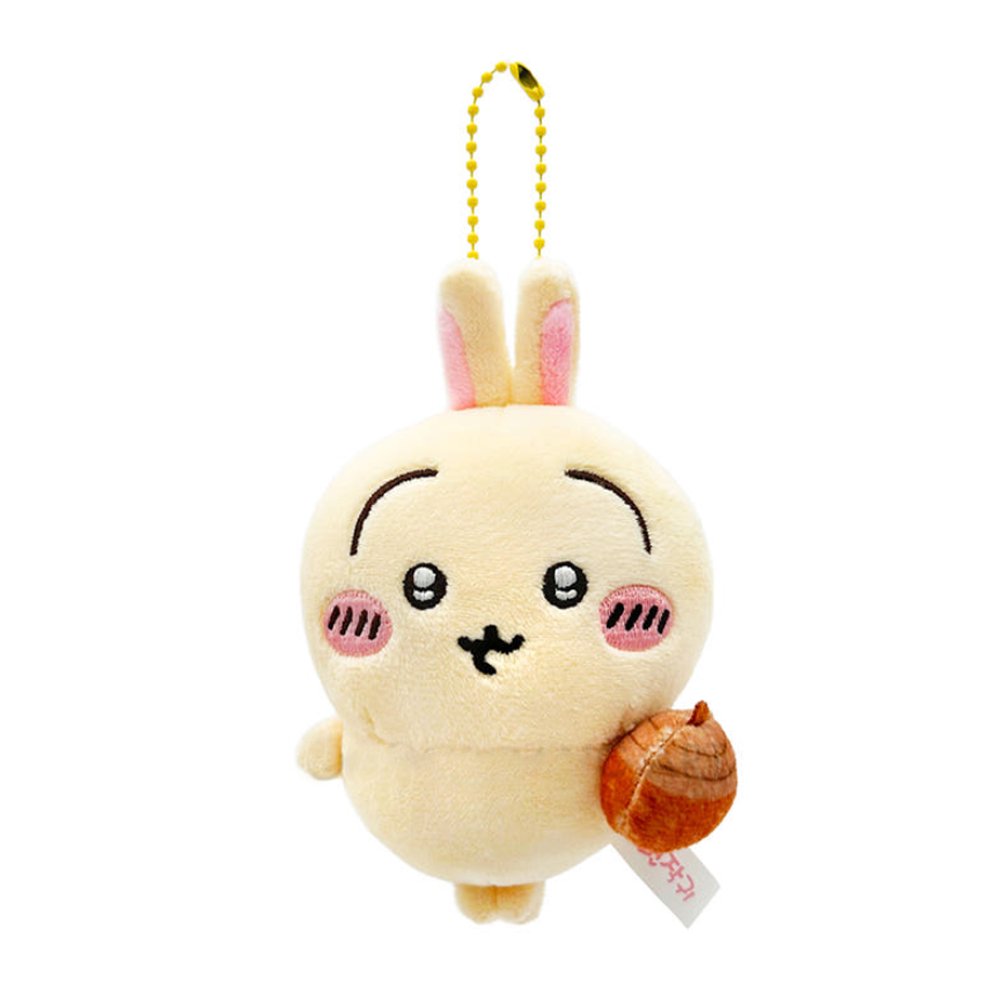 An officially licensed Usagi plush keychain holding a small plush acorn, suspended from a yellow ball chain