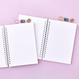 Officially licensed Chiikawa spiral notebooks with index tabs, featuring Chiikawa studying on a pink cover, while the other shows the trio on a yellow and blue background; both include built-in tabs shaped like a bear, a camera, and an acorn.