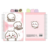 Officially licensed Chiikawa spiral notebooks with index tabs, featuring Chiikawa studying on a pink cover, while the other shows the trio on a yellow and blue background; both include built-in tabs shaped like a bear, a camera, and an acorn.
