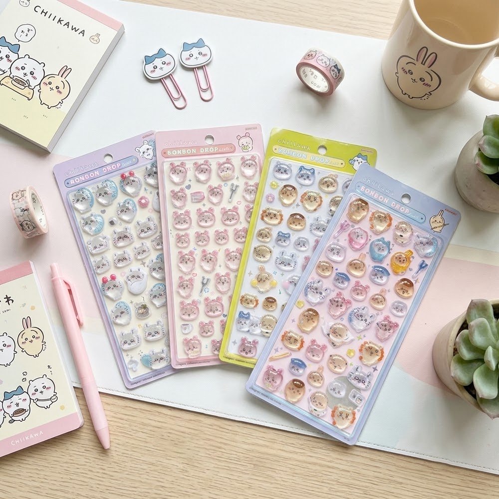 Four colorful officially licensed Chiikawa and Friends Bonbon Drop 3D resin sticker sheets, featuring Chiikawa, Hachiware, Usagi, and other fan-favorite friends in cute poses