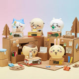 A collection of officially licensed Chiikawa digital watches featuring characters like Chiikawa, Hachiware, and Usagi sitting behind miniature cardboard box bases. Each base includes a small digital clock screen, and the set includes five visible designs.