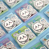 Officially licensed Chiikawa set of three character mini die-cut erasers featuring Chiikawa and Hachiware arranged next to their colorful blister packaging
