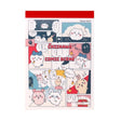 Officially licensed Chiikawa memo pads, one featuring a blue aquatic theme and the other a colorful comic book panel design. The interior pages show detailed character illustrations of Chiikawa, Hachiware, and Usagi.