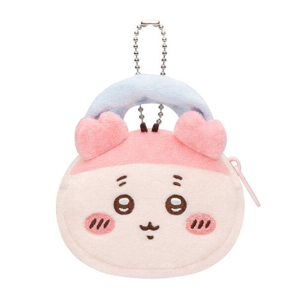 An officially licensed Chiikawa and Friends fluffy mini pouch keychain, featuring the light pink, round pouch features Kani's face with embroidered details, pink plush ears, and a silver ball chain for hanging.