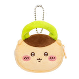 An officially licensed Chiikawa and Friends fluffy mini pouch keychain, featuring the yellow brown, round pouch features Kurimanju's face with embroidered details, plush ears, and a silver ball chain for hanging.