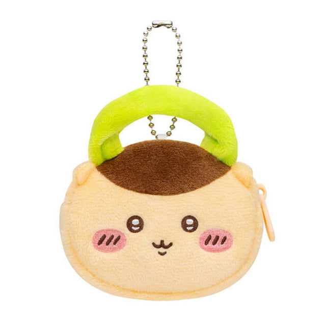 An officially licensed Chiikawa and Friends fluffy mini pouch keychain, featuring the yellow brown, round pouch features Kurimanju's face with embroidered details, plush ears, and a silver ball chain for hanging.