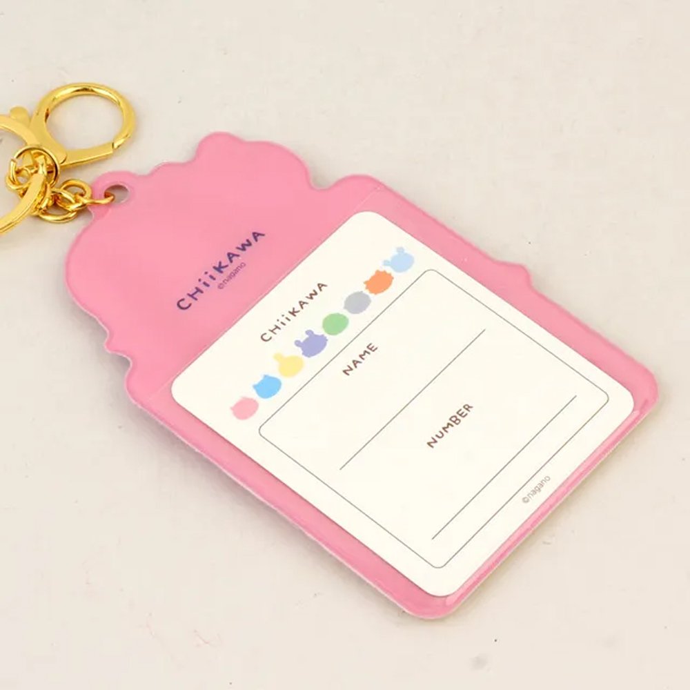 Colorful, officially licensed Chiikawa photo frame keychains featuring pastel gradients, character illustrations, and transparent window slots. Gold keyrings and lobster clasps are attached at the top of each charm holder.