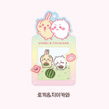 Colorful, officially licensed Chiikawa photo frame keychains featuring pastel gradients, character illustrations, and transparent window slots. Gold keyrings and lobster clasps are attached at the top of each charm holder.